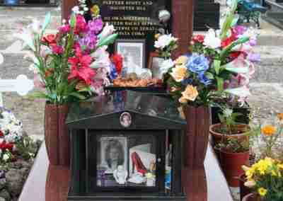 Red granite tombstone